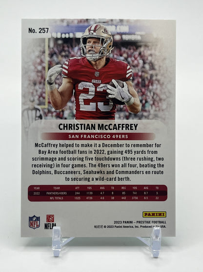 2023 Panini Prestige #257 Christian McCaffrey Xtra Points Premium Green #/199