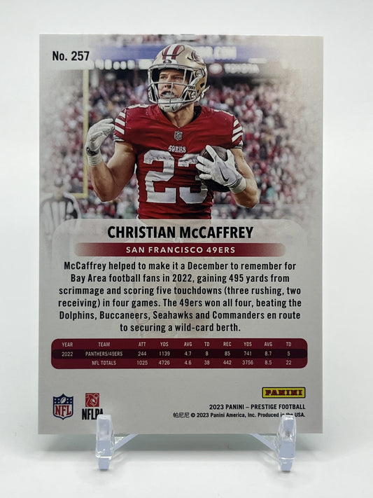 2023 Panini Prestige #257 Christian McCaffrey Xtra Points Premium Green #/199