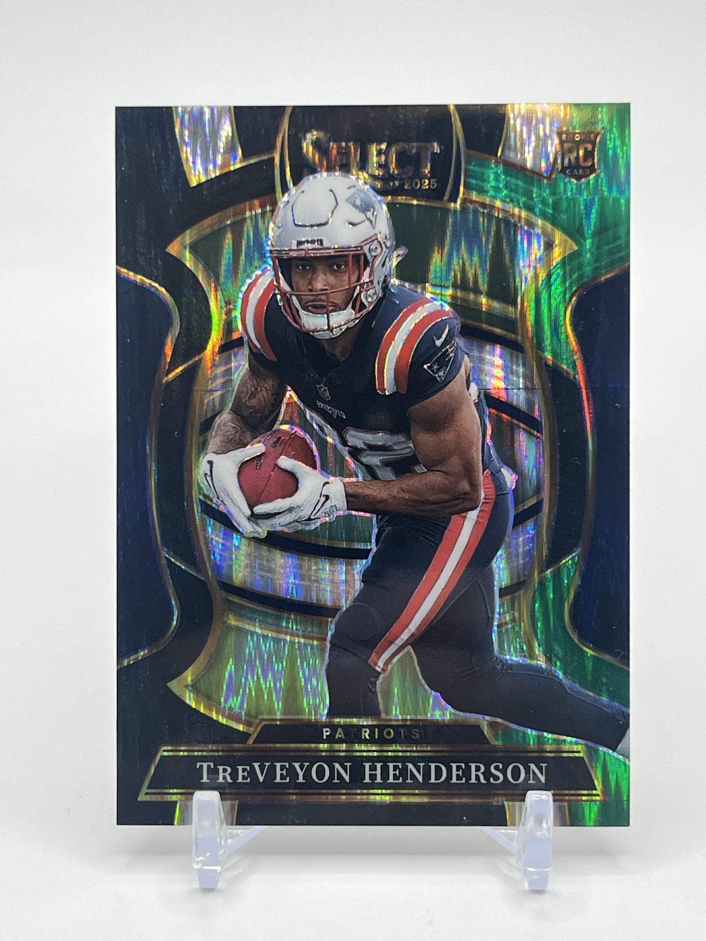 2025 Panini Select #78 TreVeyon Henderson Black and Green Prizm Shock RC