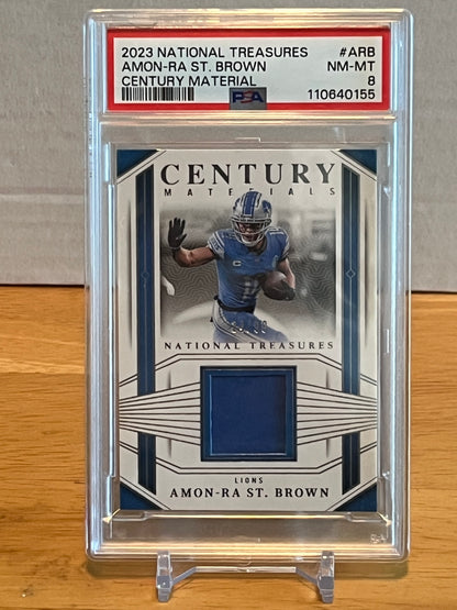 2023 Panini National Treasures Amon-Ra St. Brown Century Material PSA 8
