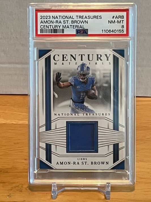 2023 Panini National Treasures Amon-Ra St. Brown Century Material PSA 8